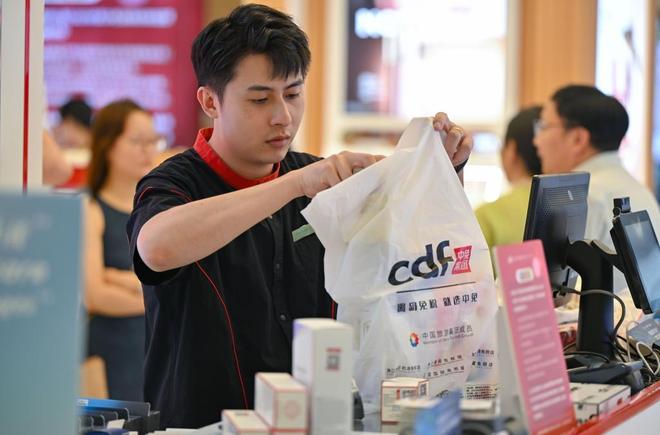 新华鲜报｜更给力！海南离岛免税购物提质扩容(图1)